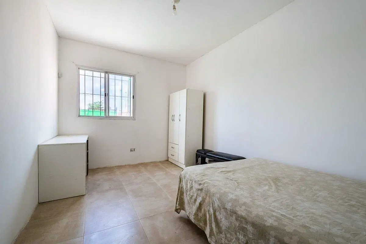 CASA 4 AMBIENTES EN VENTA EN LONGCHAMPS PISCINA 4