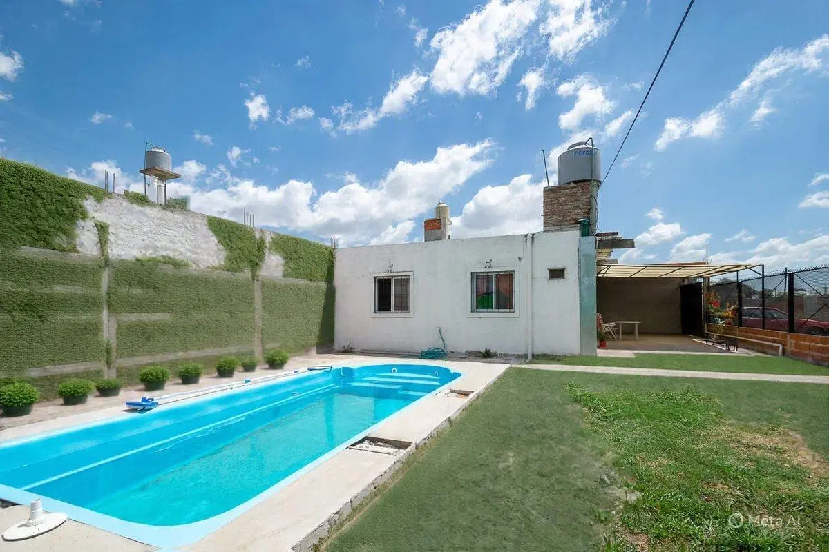 CASA 4 AMBIENTES EN VENTA EN LONGCHAMPS PISCINA 3