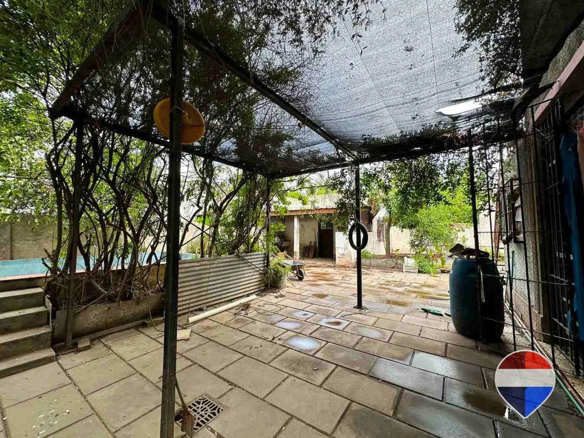 CASA y  3 LOCALES SOBRE 3 TERRENOS  EN LAS HERAS 5