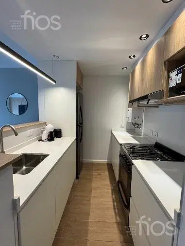VENTA DEPARTAMENTO EN CONSTRUCCION DE DOS DORMITORIOS CON BALCON Y AMENITIES EN ZONA CENTRO 3