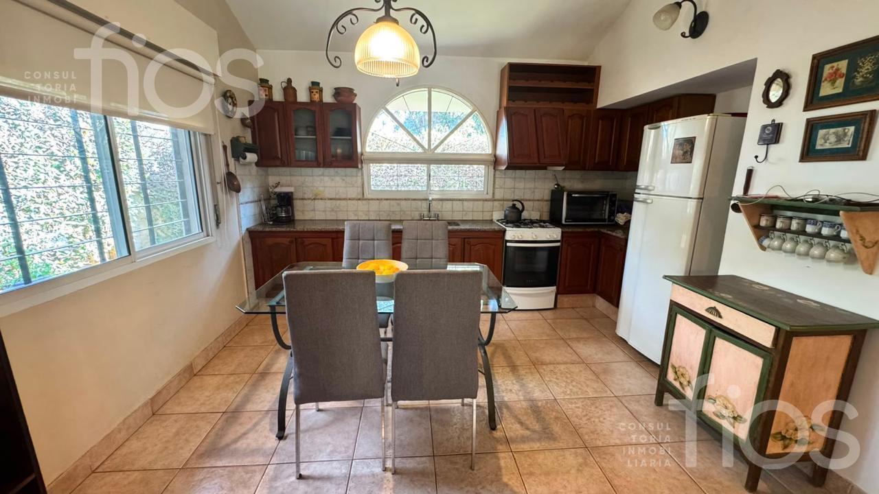 Foto de VENTA CASA 1 DORMITORIO CON PARQUE, PILETA Y QUINCHO EN FUNES, imagen 5