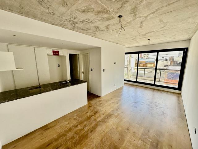 Departamento de diseño con Balcón en L