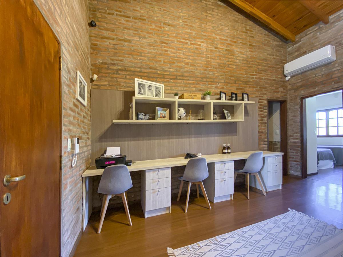 Casa de 4 Dorm. con Pileta y Quincho 3