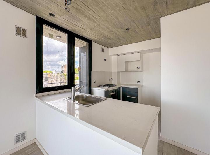 Departamento de 2 dormitorios con terraza exclusiva y parrillero en Pichincha 3