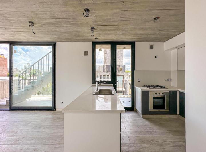 Departamento de 2 dormitorios con terraza exclusiva y parrillero en Pichincha 4