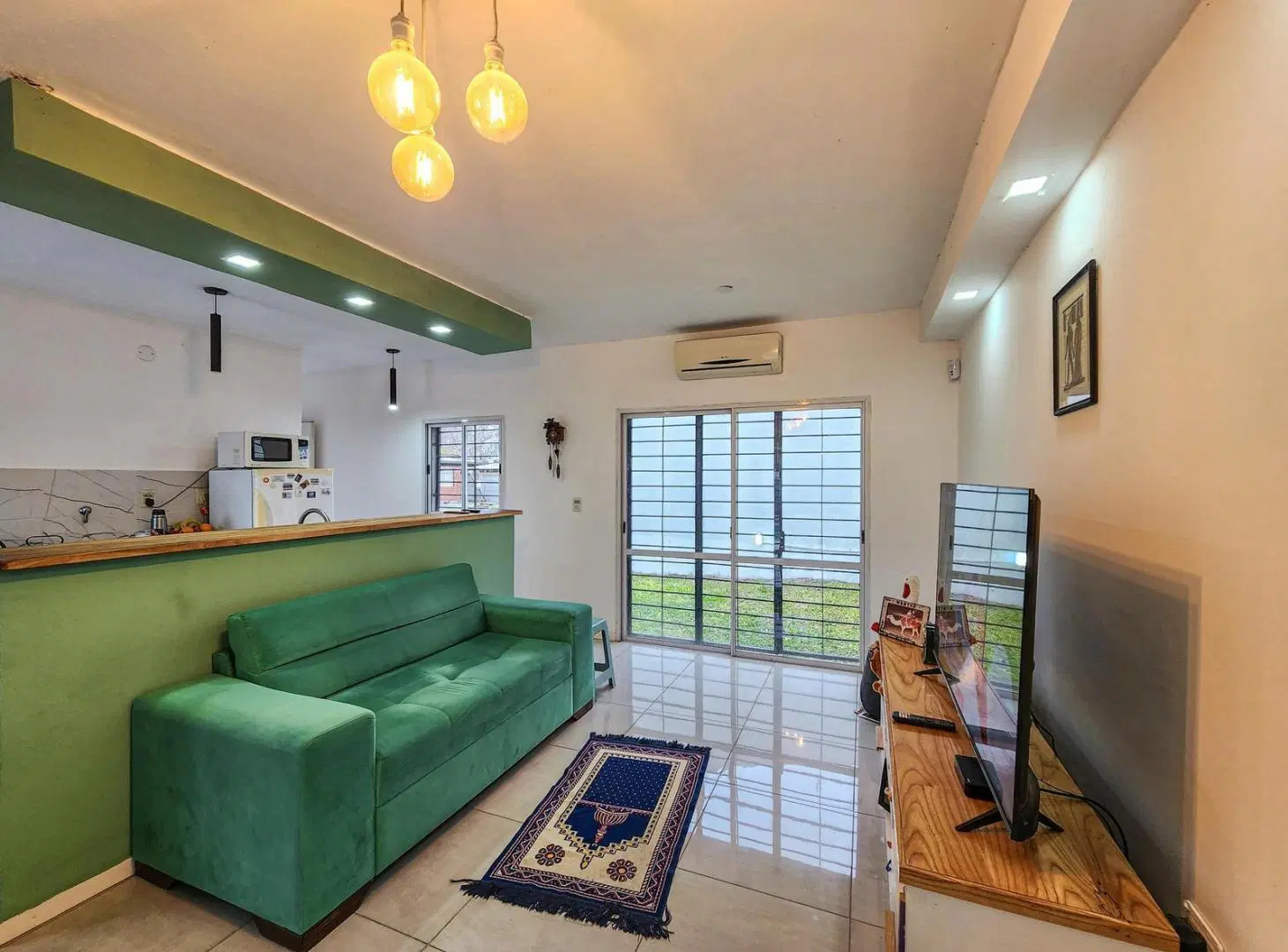 Casa de 2 dormitorios con pileta y jardin en Roldan 3