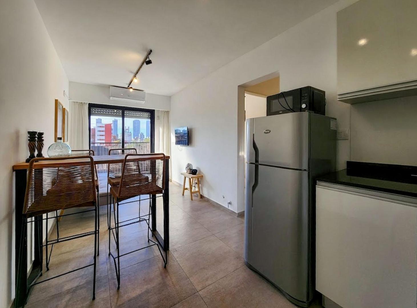 Foto de Departamento de 1 dormitorio amoblado con terraza y parrillero en Alquiler, imagen 1