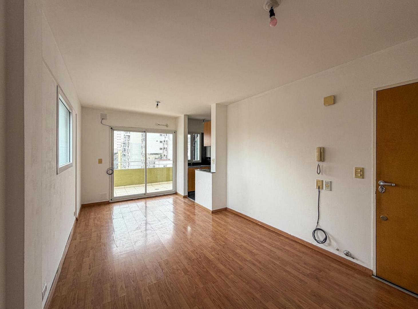 Foto de Departamento de 1 dormitorio al frente en zona río con balcón aterrazado, imagen 1