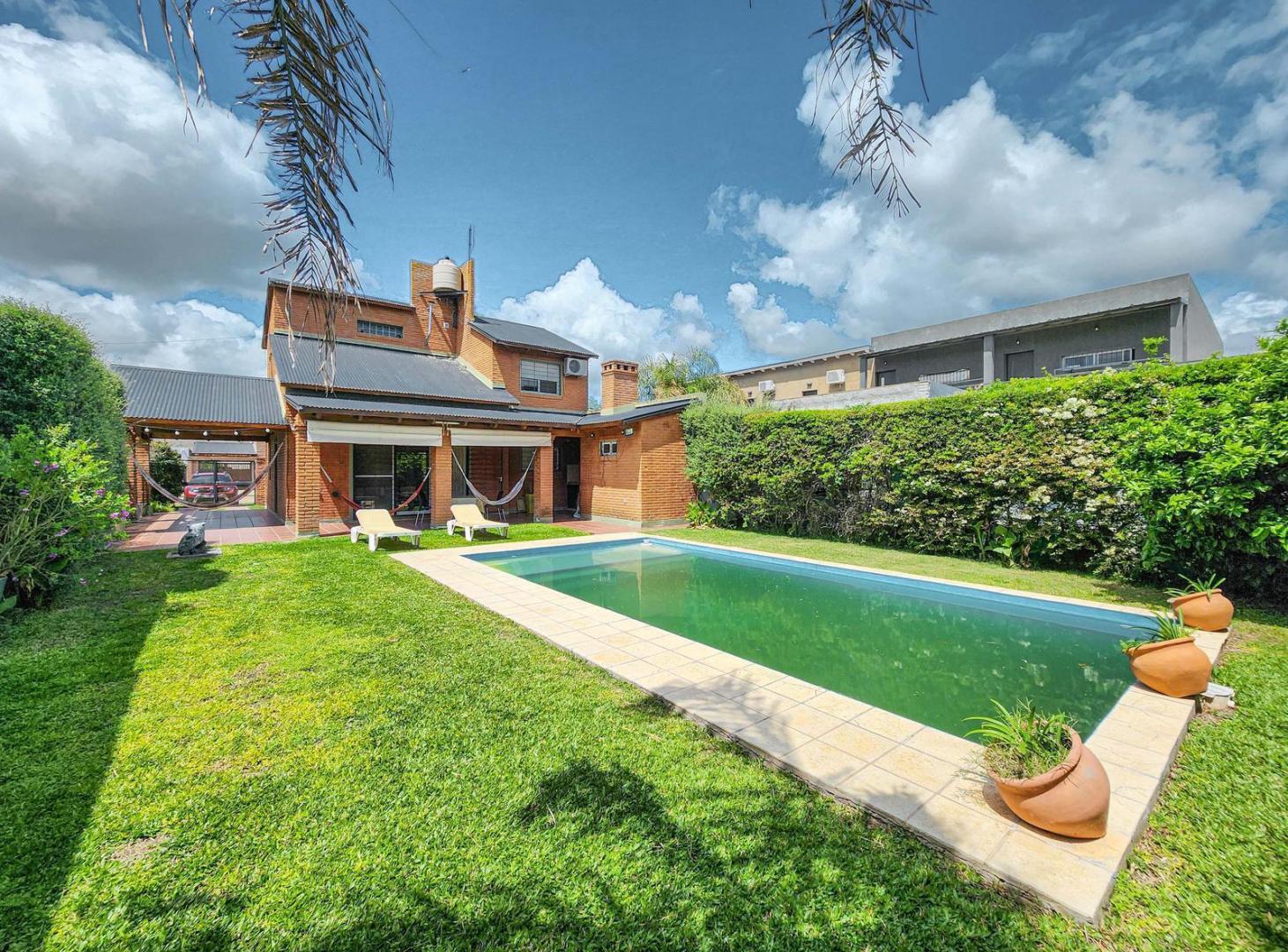 Foto de Casa de 3 dormitorios con pileta en Tierra de Sueños 1, Roldan, imagen 1