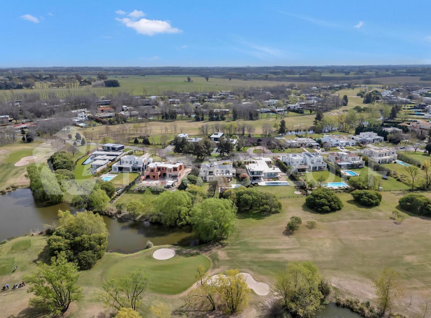 Foto de Casa en venta en Estancias del Golf Pilar con vista al Golf y la laguna, imagen 3