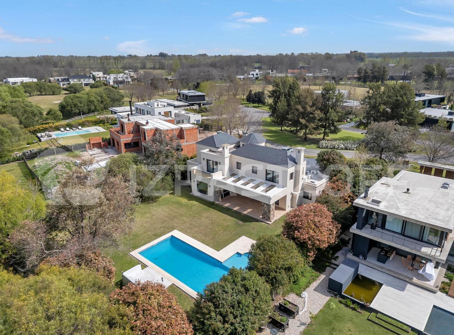 Foto de Casa en venta en Estancias del Golf Pilar con vista al Golf y la laguna, imagen 5