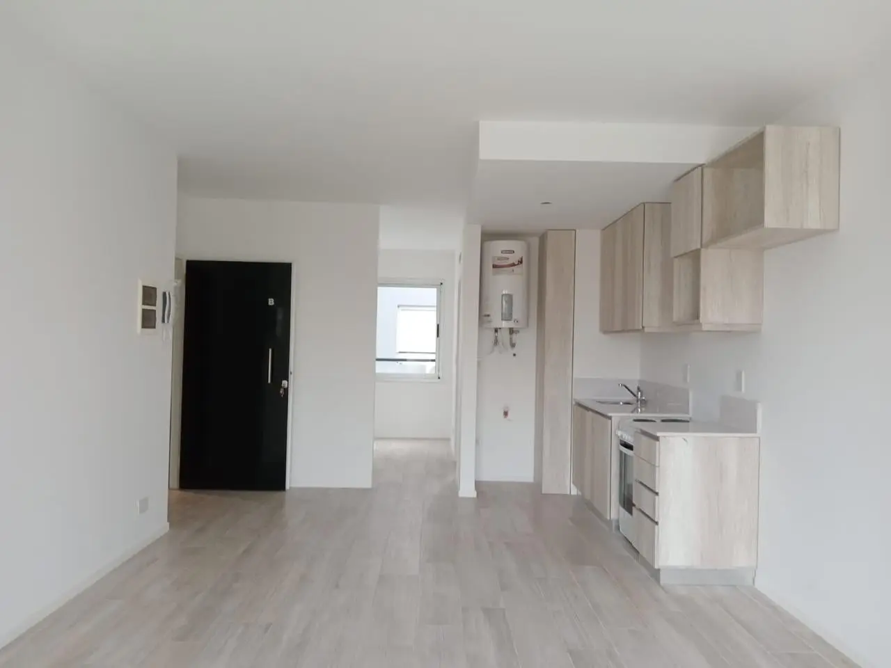 VENTA DEPARTAMENTO DOS AMBIENTES BALCON-PARRILLA-PATIO EN PARQUE CHAS-COCHERA FIJA OPCIONAL 2