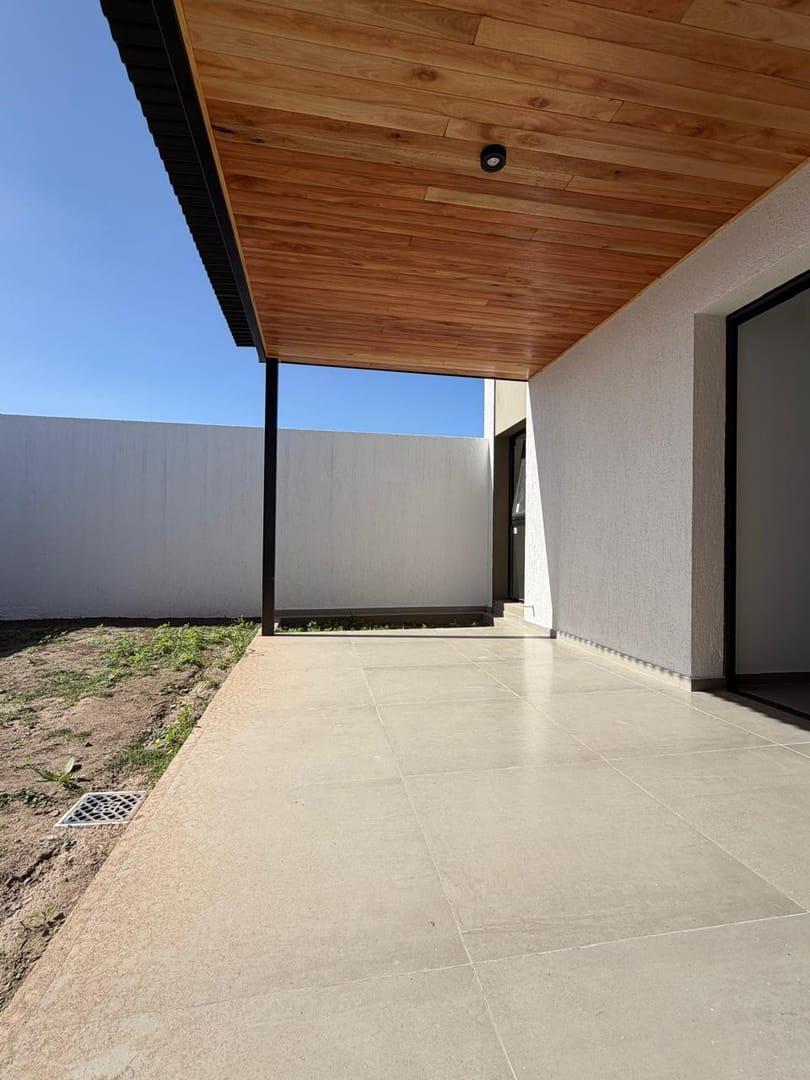 Foto de DUPLEX EN PLANTA BAJA PAMPAS DE MANANTIALES EXCELENTE CALIDAD, imagen 4