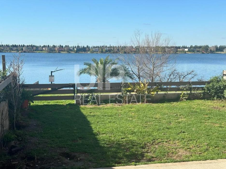 Foto de Departamento 3 ambientes con jardín a la laguna en Villanueva, imagen 1