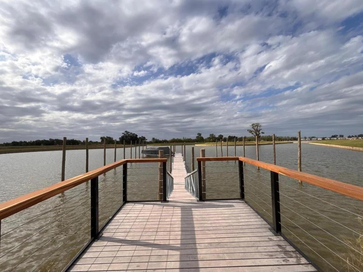 Foto de Terreno / Lote en venta al rio 707m2 ubicado en Barrio Bahia VillaNueva, imagen 1