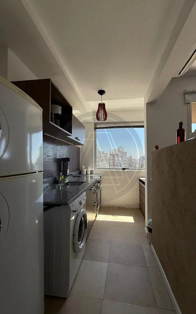 Departamento semipiso de 2 ambientes con cochera en alquiler temporal - Villa Pueyrredon 5