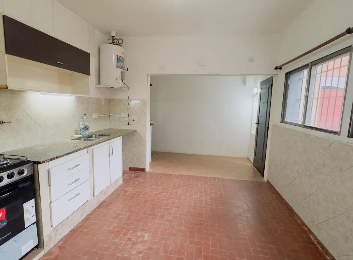 Departamento en planta baja con patio y lavadero 4