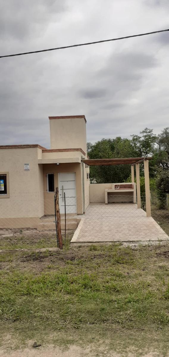 VENDO CASA EN MOLINARI CON TERRENO DE 500MTS 2 DORMITORIOS