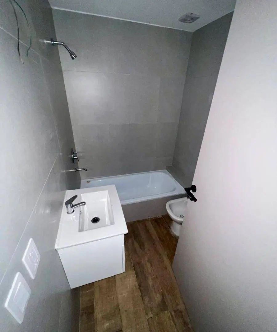 DEPARTAMENTO 2 AMB - PB AL FRENTE - CON COCHERA Y PATIO - A ESTRENAR 4