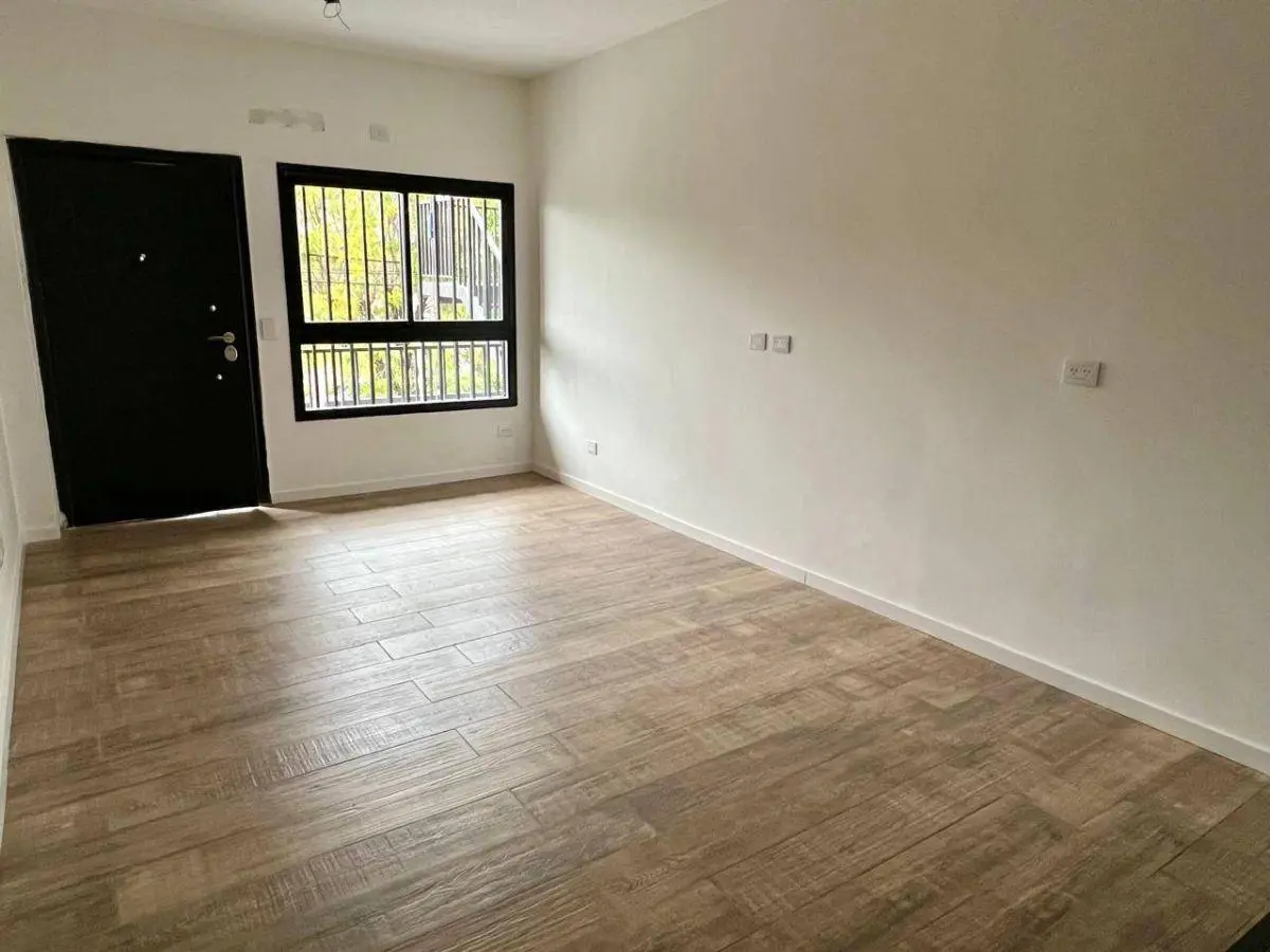 DEPARTAMENTO 2 AMB - PB AL FRENTE - CON COCHERA Y PATIO - A ESTRENAR 3