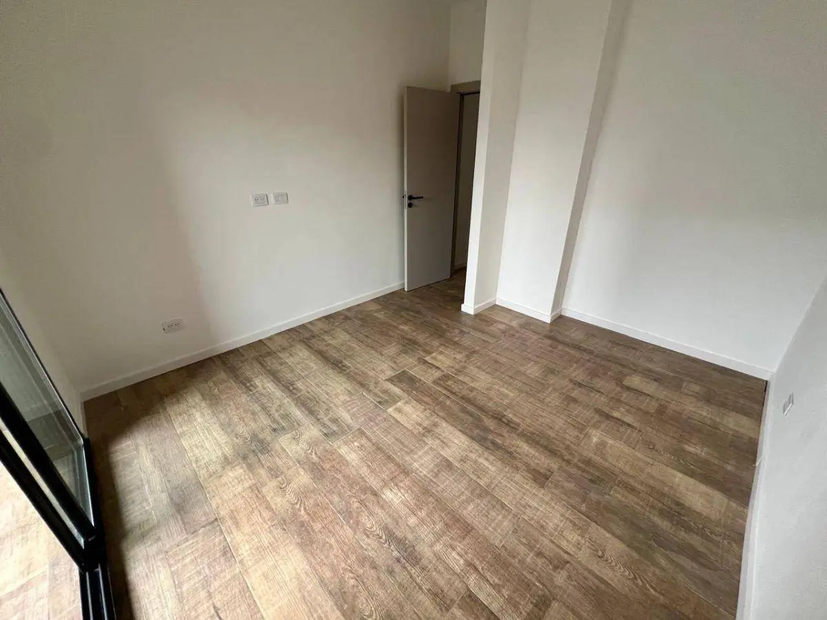DEPARTAMENTO 2 AMB - PB AL FRENTE - CON COCHERA Y PATIO - A ESTRENAR 5