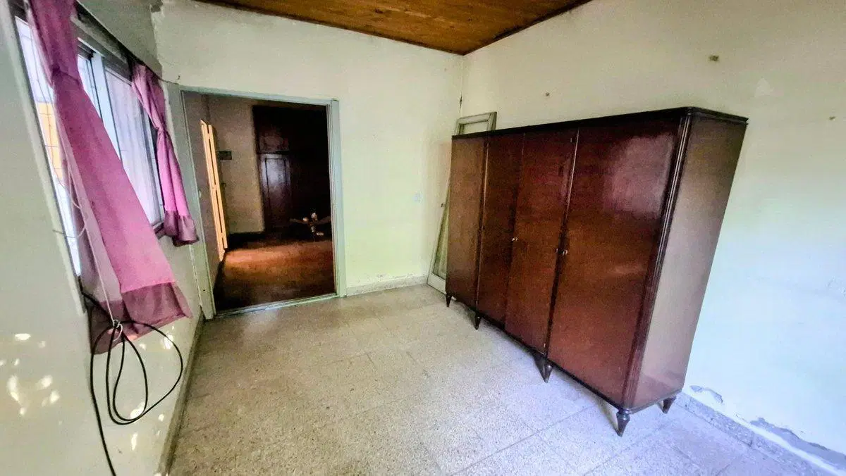 CASA 2 AMB + 2 LOCALES AL FRENTE ITUZAINGO 4