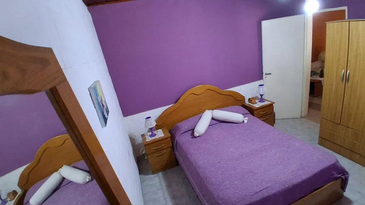 VENTA CASA DE 4 AMB. CON QUINCHO, GARAGE EN LUJAN 2