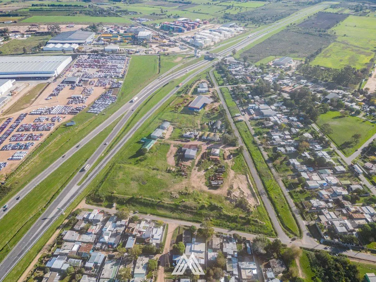 VENTA DE TERRENO CON DEPÓSITOS-OFICINAS RUTA 1 2