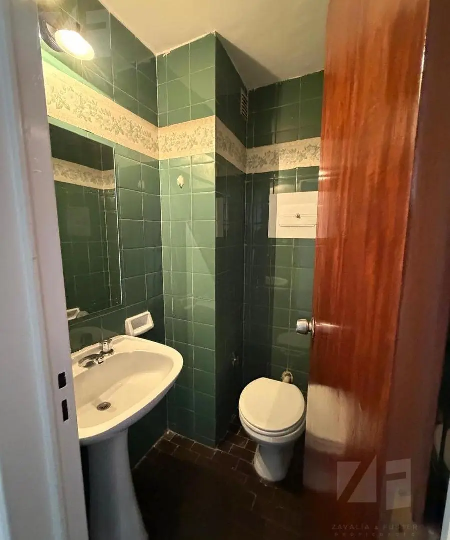 Departamento de 2 dormitorios con balcón a la calle y cochera 4