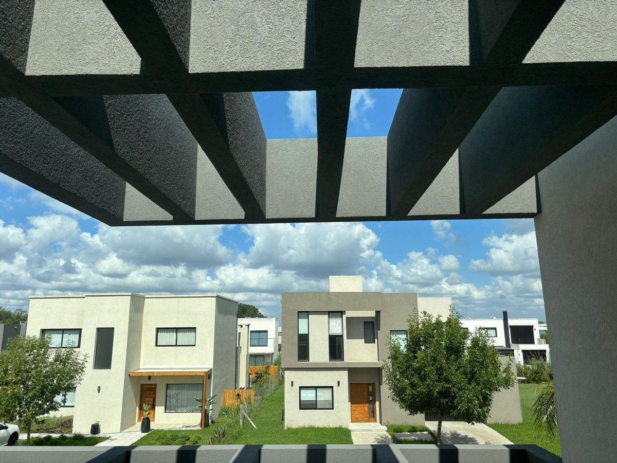 Foto de VENTA ESPECTACULAR CASA A ESTRENAR EN LAGOON PILAR, imagen 2