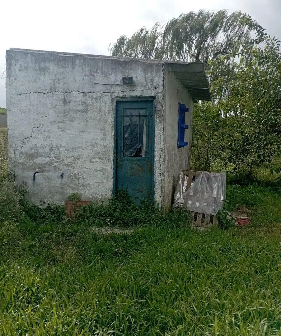 Venta de terreno con construcción  en Pando 3