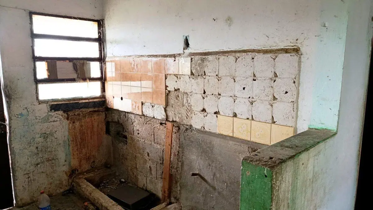 Venta de terreno con construcción  en Pando 4