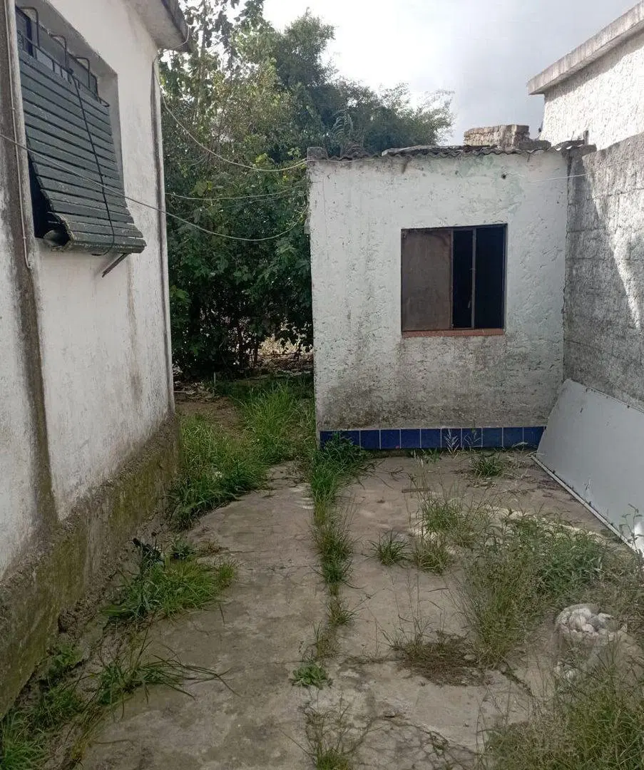 Venta de terreno con construcción  en Pando 2