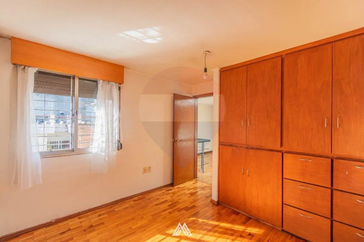 Venta de casa con 3 dormitorios en centro de Pando 4