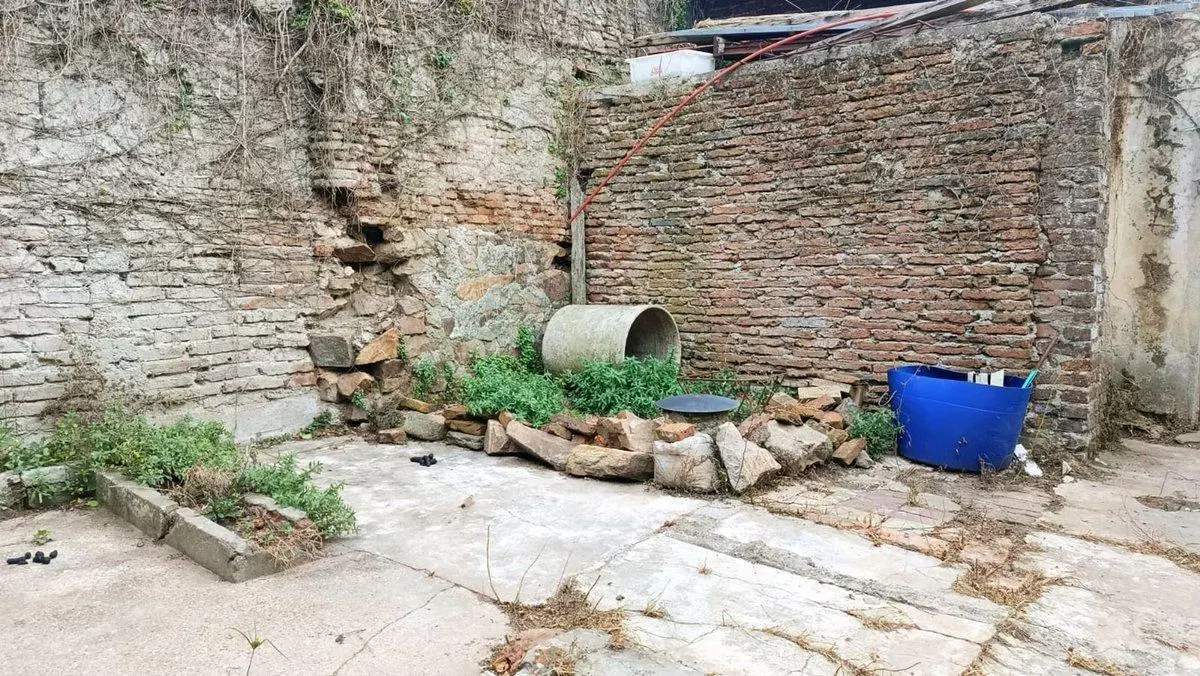 Venta de terreno con construcción en Pando 3