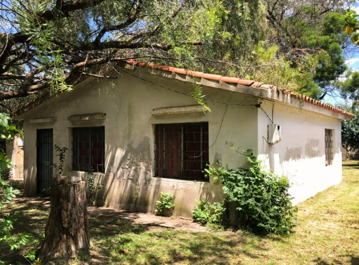 Venta terreno con mejoras en San Luis 4