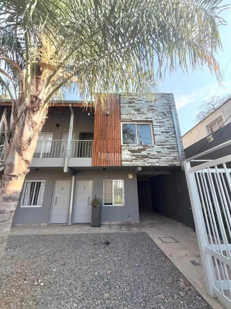 VENTA DEPARTAMENTO CON PATIO Y COCHERA EN COMPLEJO CERRADO 5