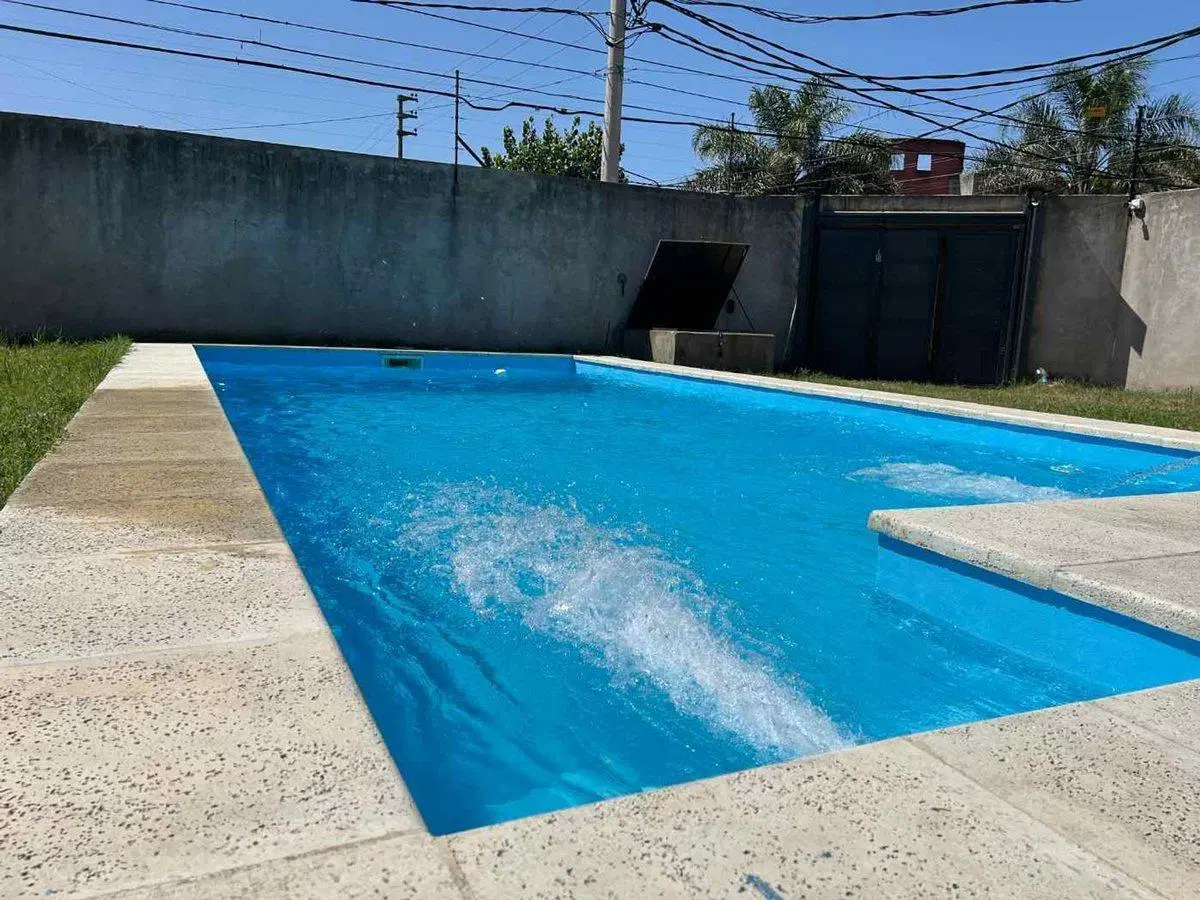 VENTA LOTE CON QUINCHO Y PISCINA EN HURLINGHAM 3