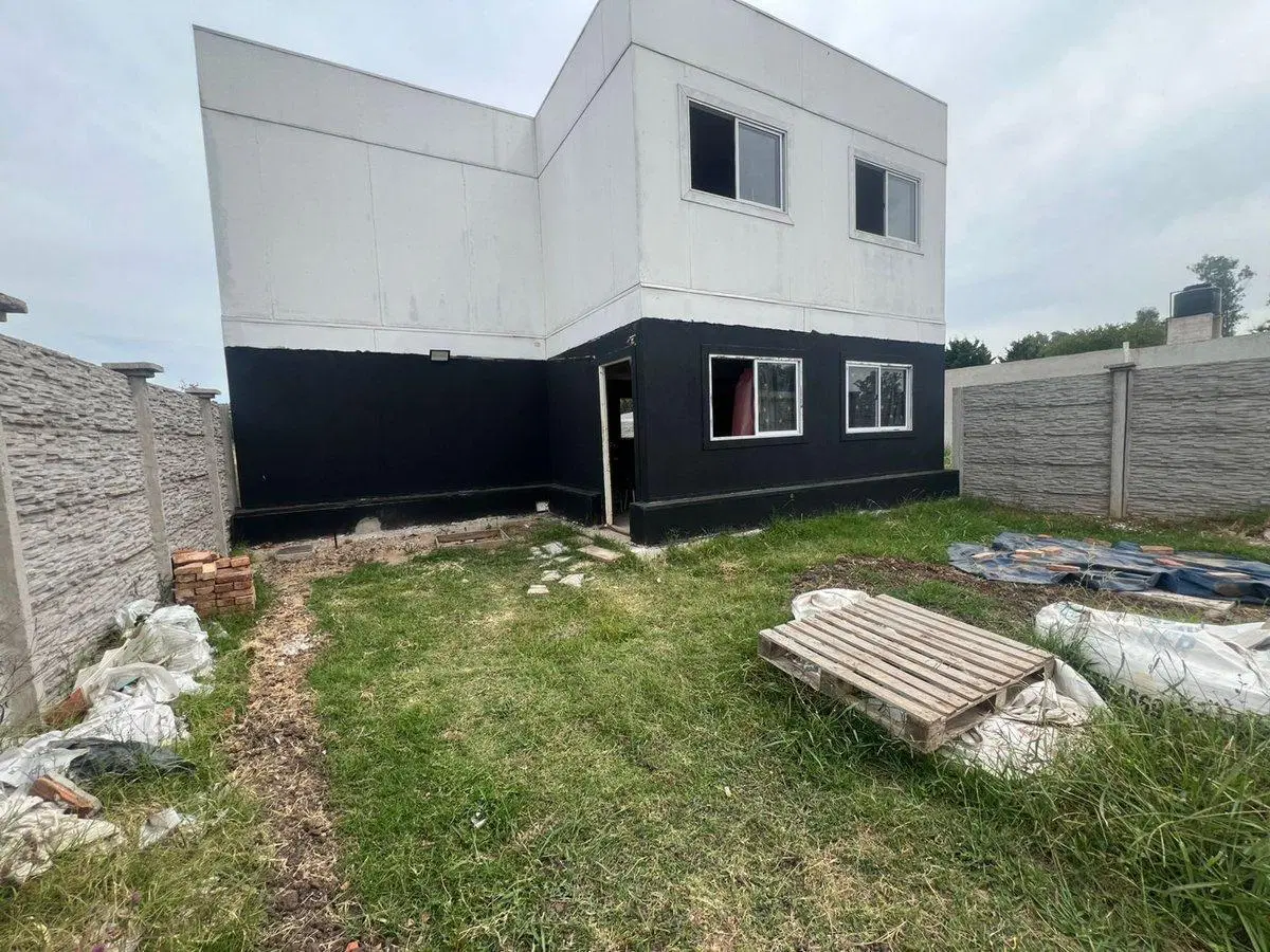 VENTA LOTE 200 M2 C PREFABRICADA B C PORTON DERQUI 5