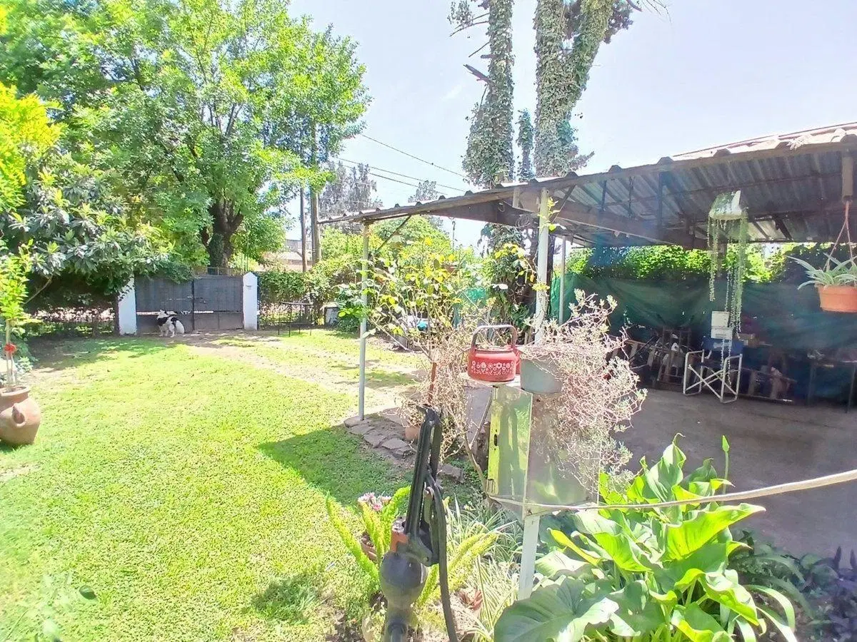 CASA 4 AMBIENTES VENTA LIBERTAD-JARDIN COCHERA 5