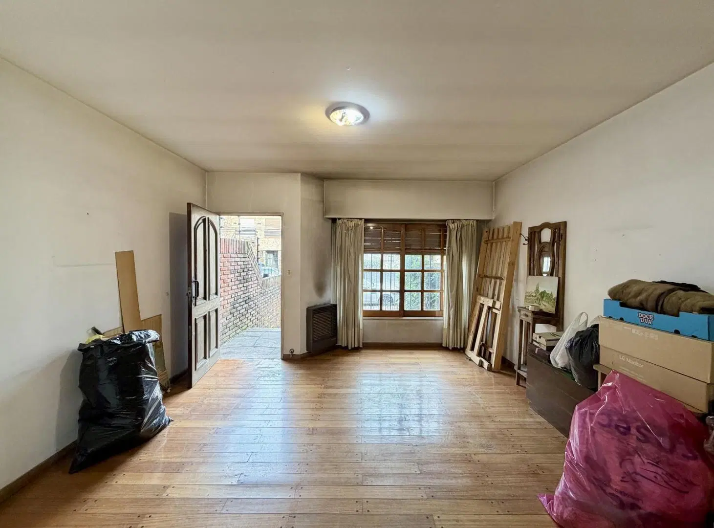 Amplio dúplex en venta con jardín y cochera ubicado en Olivos, Vicente López. 1