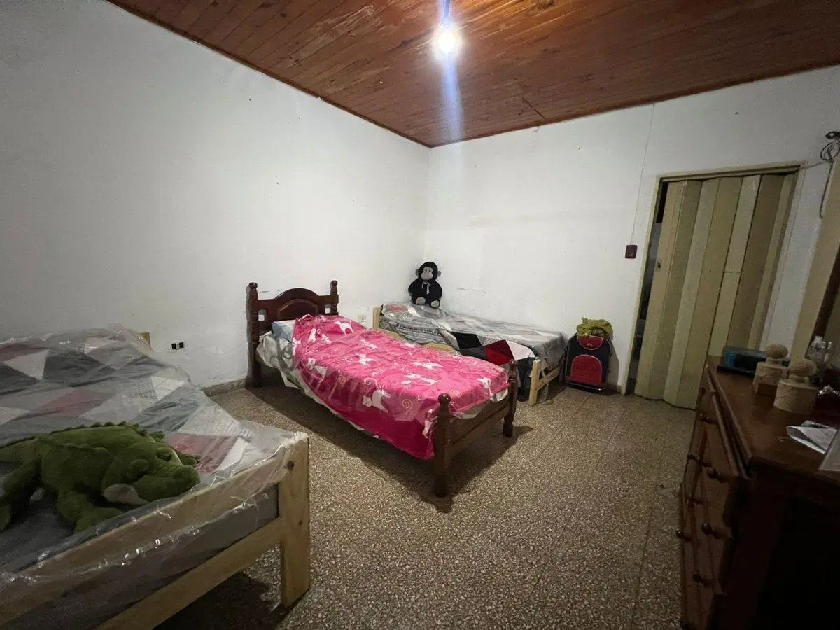 VENTA CASA 2 DORMITORIOS MAS COMODIN PATIO Y LOCAL 5