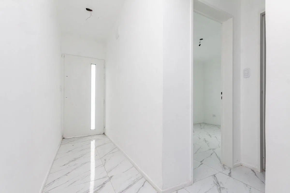 VENTA CASA A ESTRENAR 4 AMB. COCHERA LANUS ESTE 3