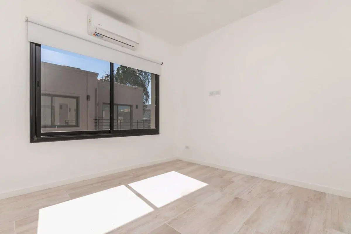 DEPARTAMENTOS EN 2 PLANTAS CON COCHERA Y PARRILLA 4