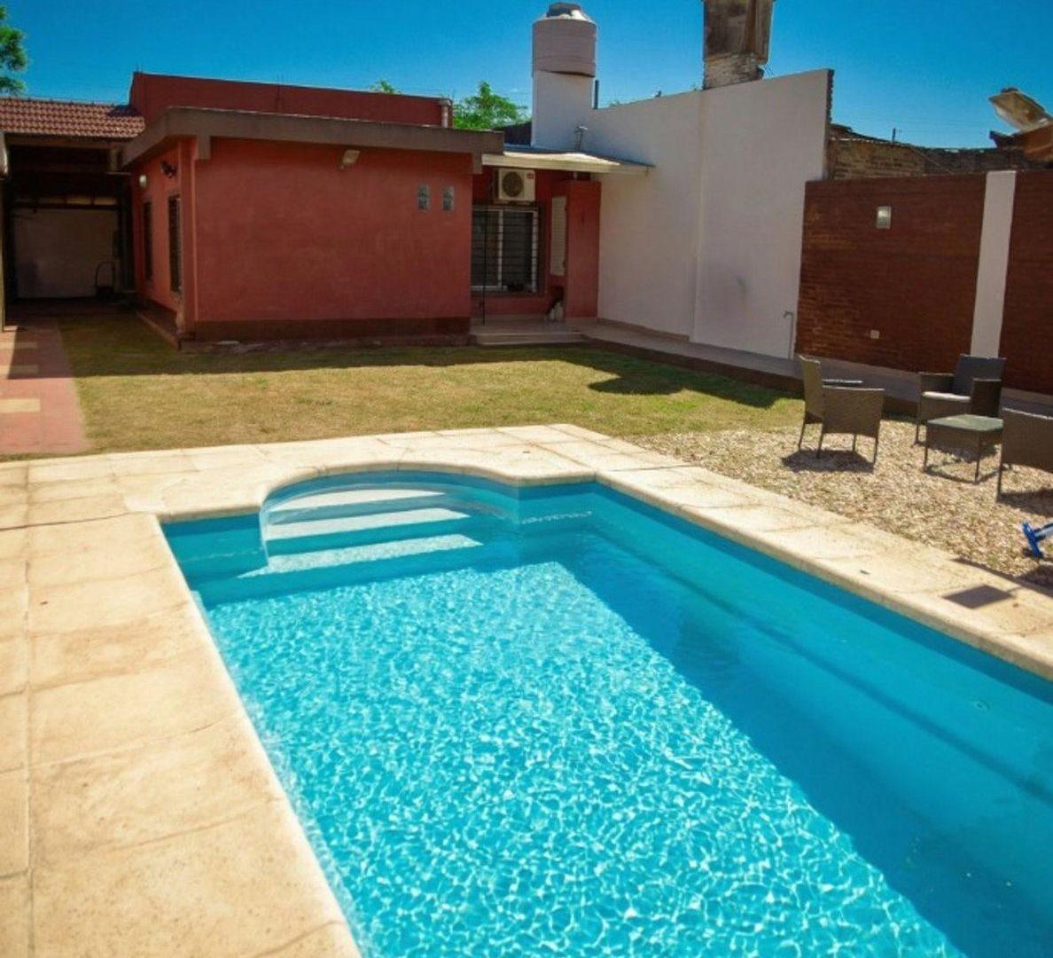 Foto de CASA CON PILETA ACEPTA PERMUTA / ESCUCHA PROPUESTA, imagen 2