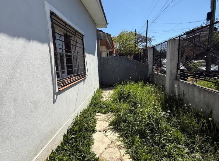 CASA 3 AMBIENTES CON GARAJE Y FONDO! 4