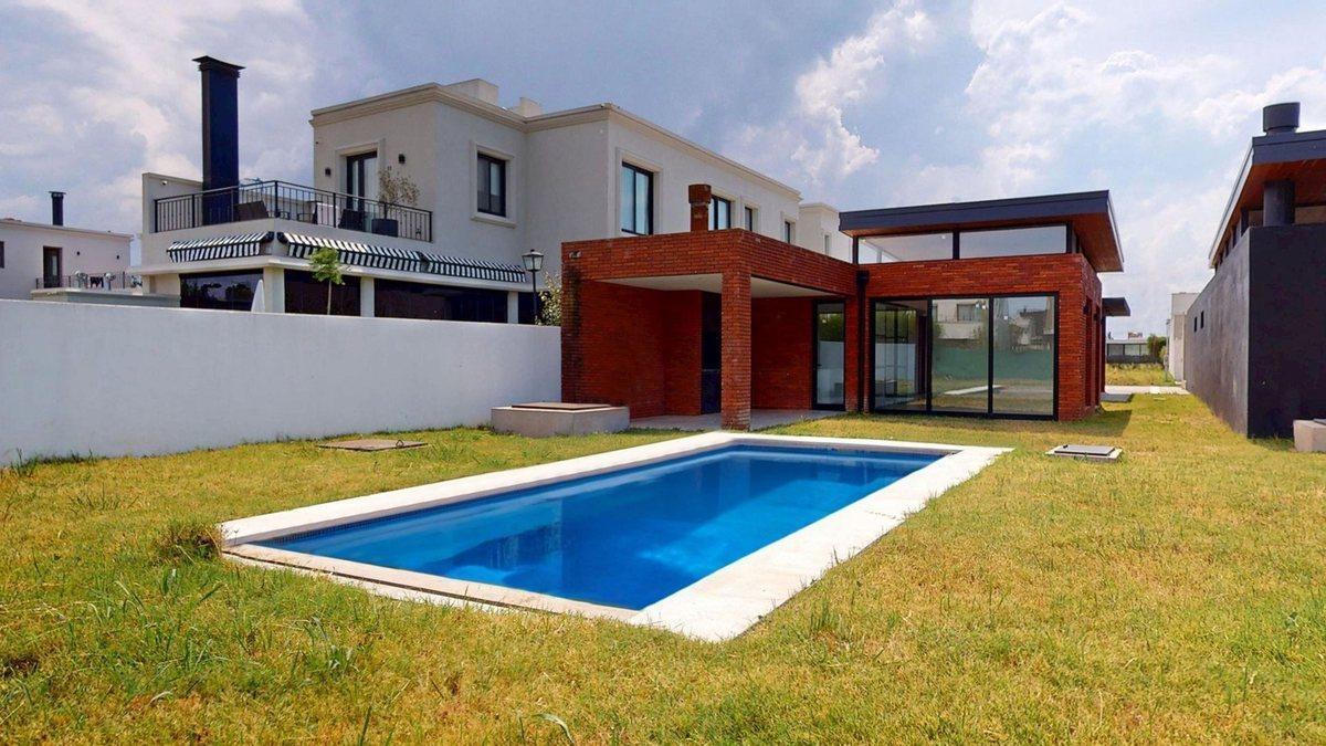 Foto de CASA EN VENTA EL QUIMILAR TRES DORMITORIOS PILETA, imagen 5