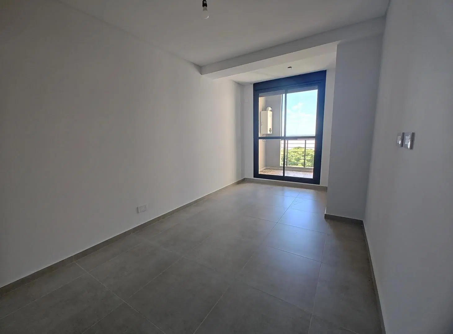 Departamento en venta de 2 dormitorios con cochera en Rosario - parque España 3
