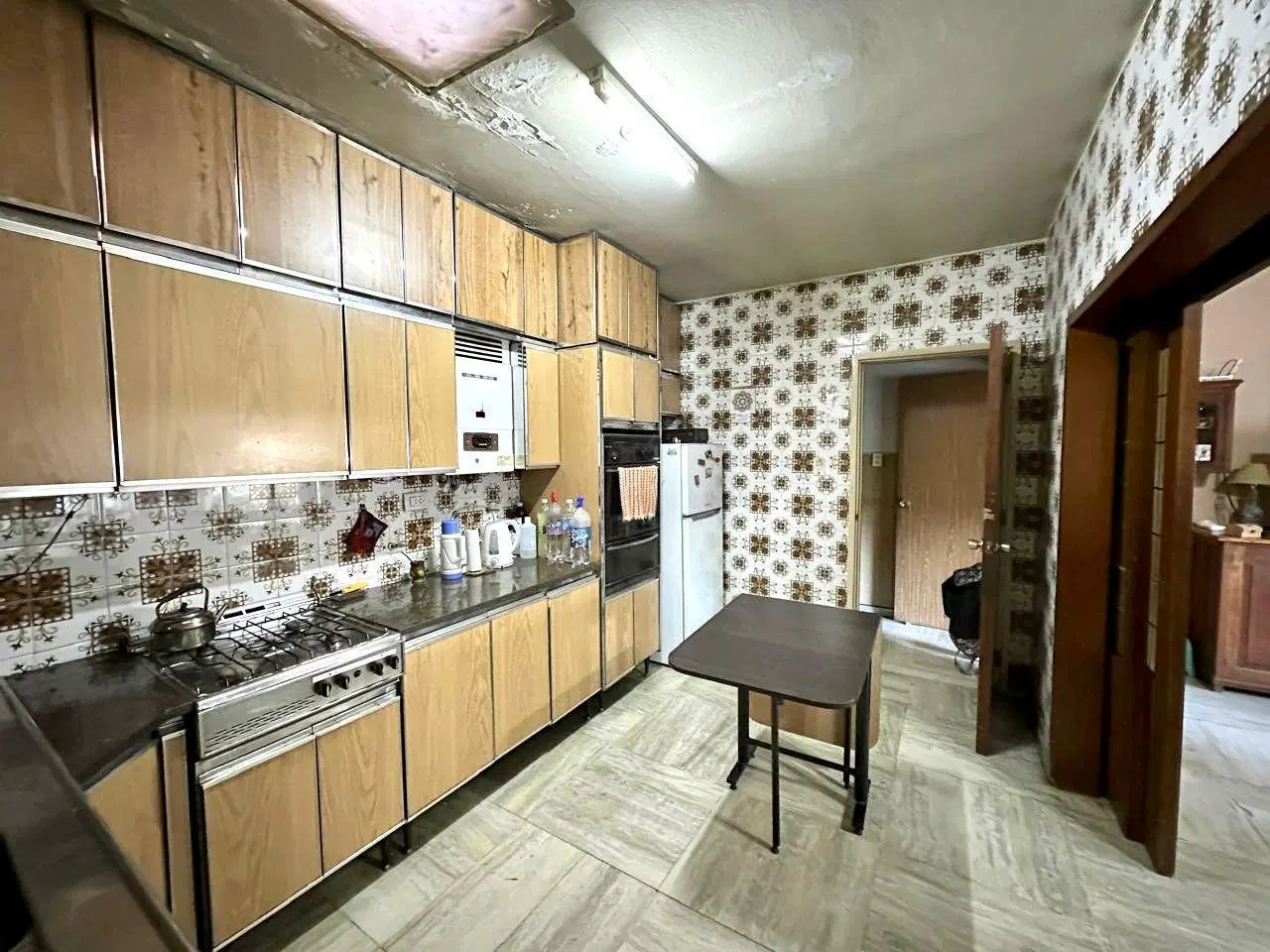 Casa en venta 3 dormitorios, dos baño, cochera, patio en Rosario - Luis Agote 4