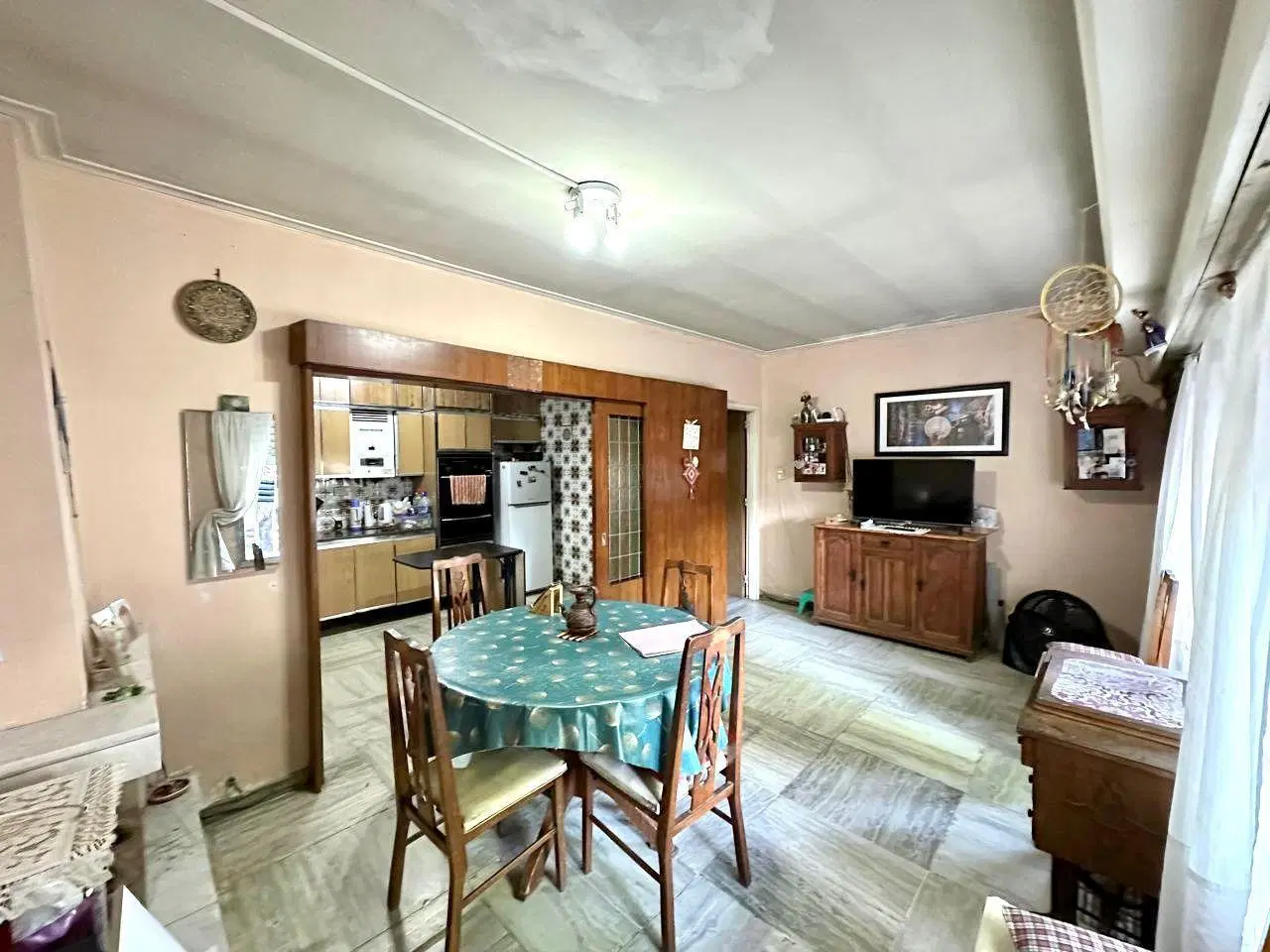Casa en venta 3 dormitorios, dos baño, cochera, patio en Rosario - Luis Agote 3